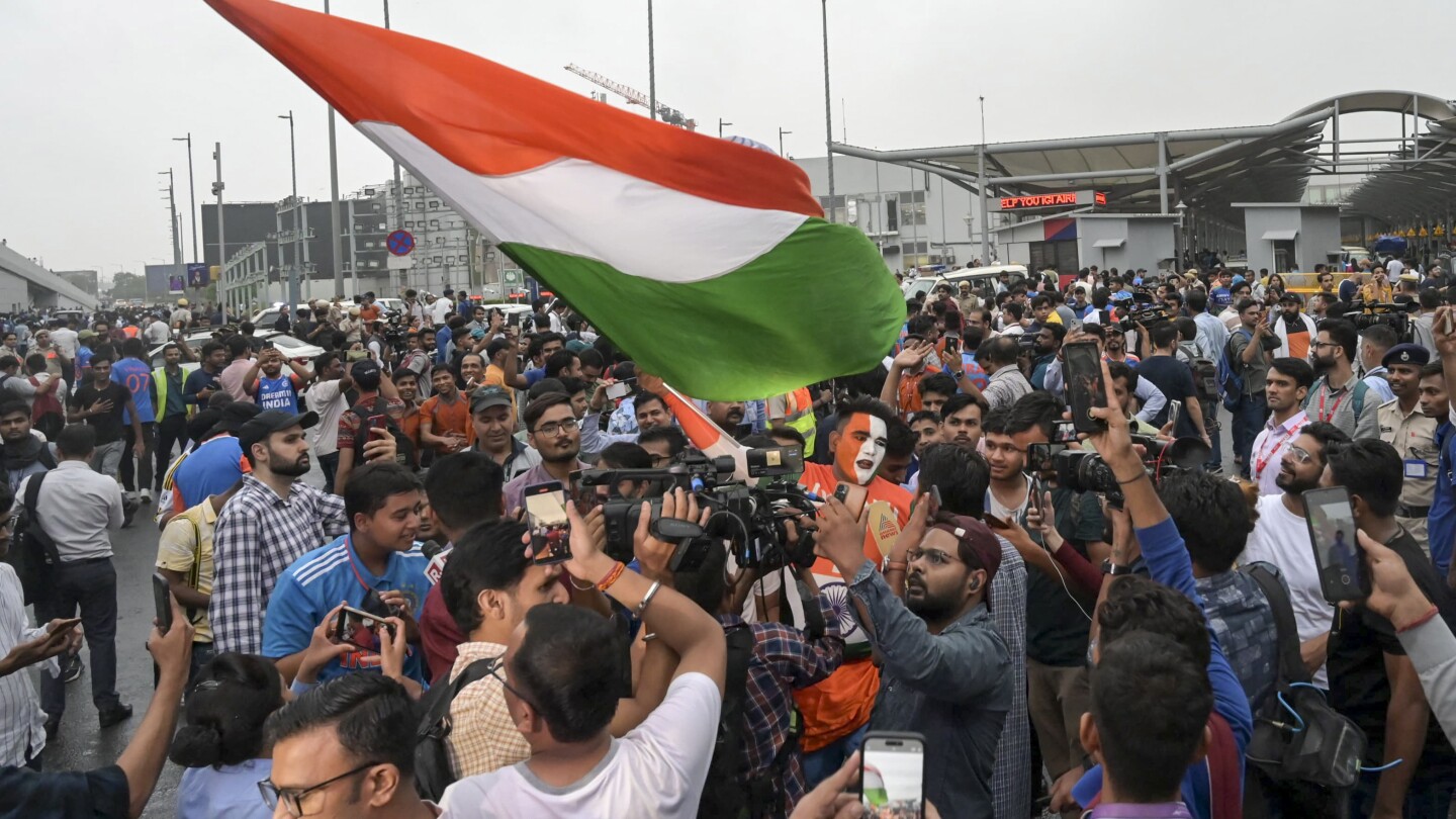Excited Indian cricketers celebrate victory as they return home from winning the Twenty20 World Cup