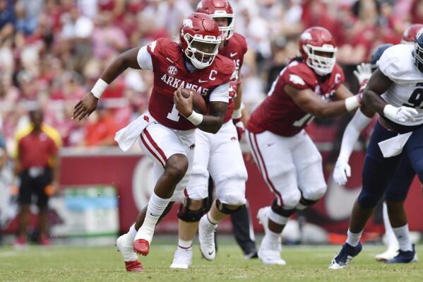 FILE - In this Saturday, Sept. 4, 2021, file photo, Arkansas quarterback KJ Jefferson (1) runs for a touchdown against Rice during the first half of an NCAA college football game in Fayetteville, Ark. Arkansas plays Texas A&M on Saturday, Sept. 25, 2021. (AP Photo/Michael Woods, File)