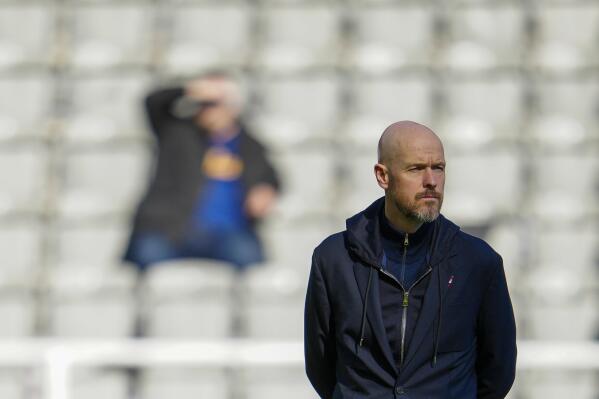 Manchester United's head coach Erik ten Hag looks on during warm up before the English Premier League soccer match between Newcastle United and Manchester United, at St. James' Park stadium in Newcastle, England, Sunday, April 2, 2023. (AP Photo/Jon Super)