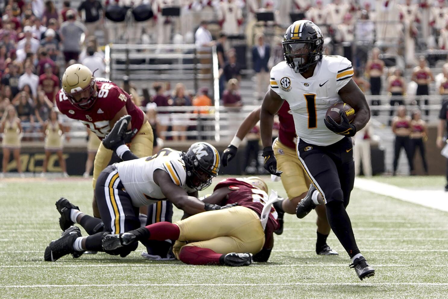 Drew Lock of the Missouri Tigers rushes for yardage during the game