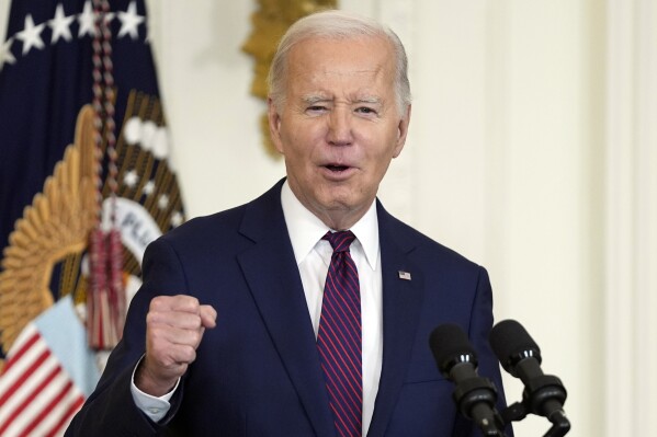 FILE - President Joe Biden speaks in the East Room, Jan. 19, 2024, in Washington. Authorities issued cease-and-desist orders Tuesday against two Texas companies they believe were connected to robocalls that used artificial intelligence to mimic President Joe Biden’s voice and discourage people from voting in New Hampshire's first-in-the-nation primary last month. (AP Photo/Evan Vucci, File)