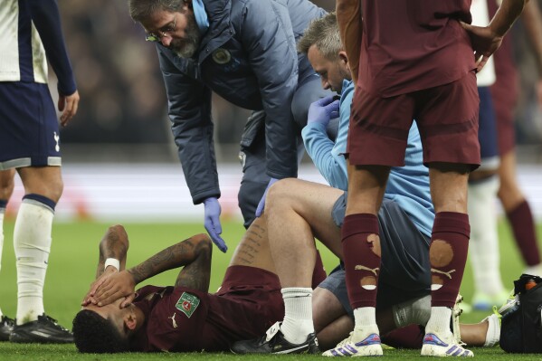 Savinho in tears while being carried off on a stretcher to add to Man  City's injury crisis | AP News