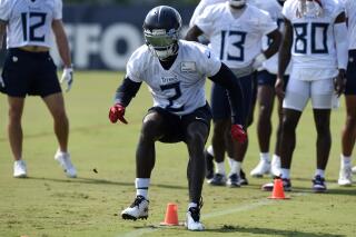 Tennessee Titans wide receiver Julio Jones (2) runs a drill during NFL football training camp Wednesday, July 28, 2021, in Nashville, Tenn. (AP Photo/Mark Zaleski)