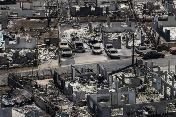 A general view shows the aftermath of a devastating wildfire in Lahaina, Hawaii, Tuesday, Aug. 22, 2023. Two weeks after the deadliest U.S. wildfire in more than a century swept through the Maui community of Lahaina, authorities say anywhere between 500 and 1,000 people remain unaccounted for. (AP Photo/Jae C. Hong)