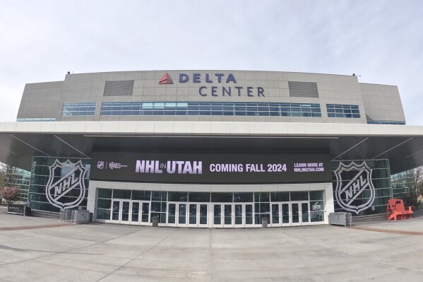 FILE - Signs celebrating the awarding of a new NHL team to Utah is displayed at the Delta Center, Friday, April 19, 2024, in Salt Lake City. Utah Hockey Club will be the name of the NHL team playing its games in Salt Lake City beginning this fall, with a long term identity still to come. (ĢӰԺ Photo/Rick Bowmer, File)