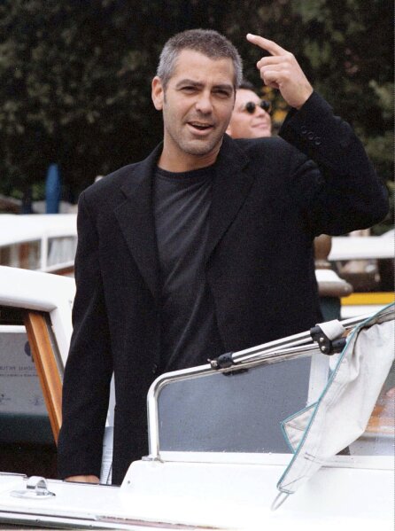  Clooney arrives at the Lido for to promote "Out Of Sight." (AP Photo/Francesco Proietti)