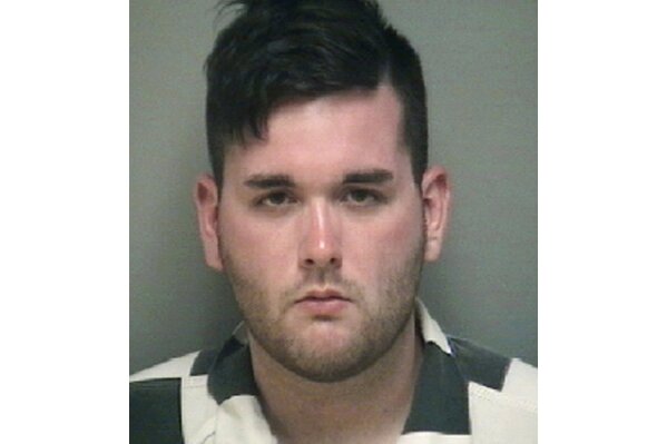
              FILE - This undated file photo provided by the Albemarle-Charlottesville Regional Jail shows James Alex Fields Jr. Fields who was convicted in a deadly car attack on a crowd of counterprotesters at a white nationalist rally in Virginia is expected to change his plea to federal hate crime charges. An online court docket updated late Tuesday, March 26, 2019, says Fields is scheduled to appear in U.S. District Court in Charlottesville on Wednesday for a change-of-plea hearing. (Albemarle-Charlottesville Regional Jail via AP, File)
            