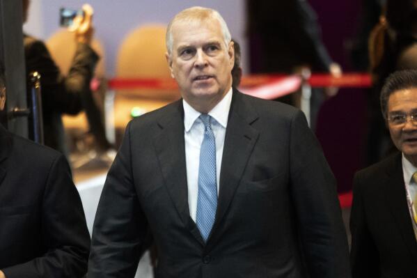 FILE - In this Nov. 3, 2019 file photo, Britain's Prince Andrew arrives at ASEAN Business and Investment Summit (ABIS) in Nonthaburi, Thailand. Prince Andrew wasn’t on trial in the Ghislaine Maxwell sex trafficking case, but her conviction is bad news for the man who is ninth in line to the British throne. (AP Photo/Sakchai Lalit, file)