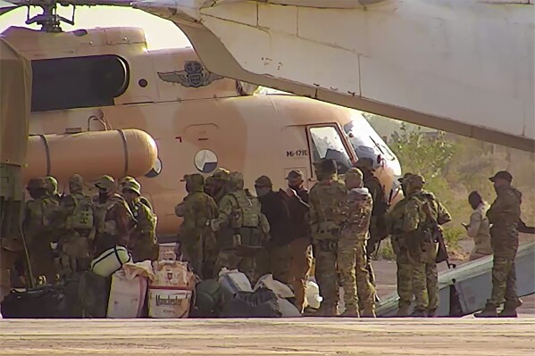FILE - This undated photograph handed out by French military shows Russian mercenaries boarding a helicopter in northern Mali. Russia's foreign minister Sergey Lavrov went on a tour of the Sub-Saharan region of the Sahel this week, as Moscow seeks to grow its influence in the restive, mineral-rich region of Africa. (French Army via AP, File)