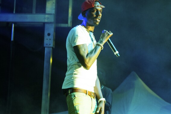 FILE - Young Dolph performs at The Parking Lot Concert in Atlanta on Aug. 23, 2020. A judge has set a trial date for two men charged with killing rapper Young Dolph in a daytime ambush at a bakery in Memphis, Tenn. Shelby County Criminal Court Judge Lee Coffee said during a hearing Friday, July 14, 2023, that Justin Johnson and Cornelius Smith are scheduled to stand trial March 11, 2024, in the fatal shooting of the Memphis-born rapper. (Photo by Paul R. Giunta/Invision/AP, File)