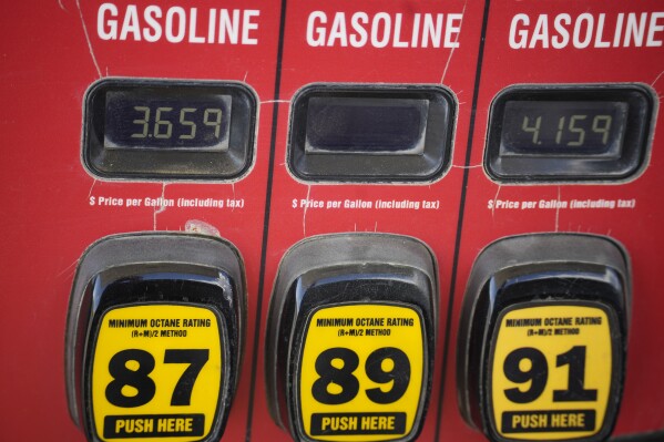 FILE - The prices of the various grades of gasoline available are displayed electronically on a pump at a filling station on Sept. 18, 2023, in Newcastle, Wyo. Oil prices have risen, meaning drivers are paying more for gasoline and truckers and farmers more for diesel. The increase also is complicating the global fight against inflation and feeding Russia's war chest to boot. (AP Photo/David Zalubowski, File)