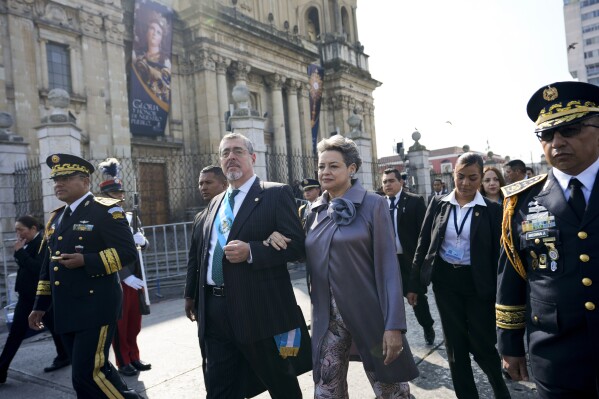 President Bernardo Arévalo and his wife, first lady Lucrecia Peinado, leave the Metropolitan Cathedral after a the 'Te Deum' Mass in Guatemala City, Monday, Jan. 15, 2024, the morning after his inauguration. Arévalo was left with huge challenges Monday after he was finally sworn into office, including his party’s lack of recognition in a Congress where he would not have a majority anyway. (AP Photo/Moises Castillo)