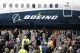 FILE- A Boeing 737 MAX 7 is displayed during a debut for employees and media on Feb. 5, 2018, in Renton, Wash. Boeing holds a virtual shareholders' meeting on Friday, May 17, 2024, as it deals with multiple federal investigations, frustrated airline customers and disappointing financial results. (AP Photo/Elaine Thompson, File)