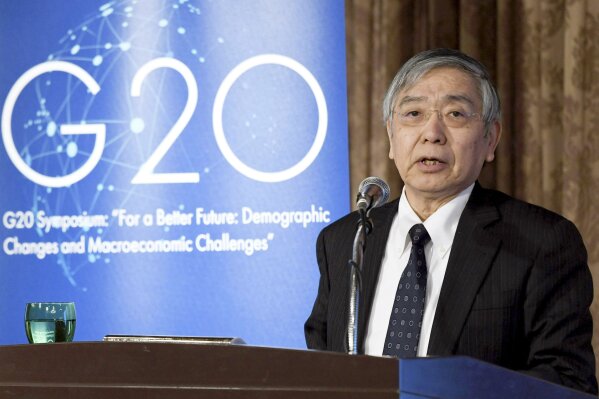 
              Bank of Japan Gov. Haruhiko Kuroda delivers a speech at a symposium in Tokyo Thursday, Jan. 17, 2019. Kuroda warned of unforeseen risks in guiding economic policy as the country’s population declines. (Kyodo News via AP)
            