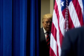President Donald Trump arrives for a Opportunity Zone conference with state, local, tribal, and community leaders South Court Auditorium of the Eisenhower Executive Office Building, on the White House complex, Wednesday, April 17, 2019, in Washington. (AP Photo/Andrew Harnik)