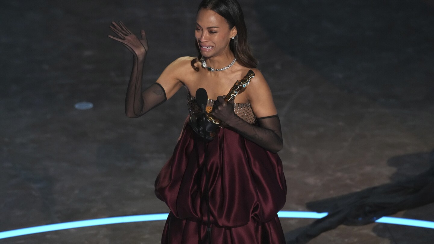 Zoe Saldaña wins first Oscar, sweeping awards season as best supporting actress in ‘Emilia Pérez’