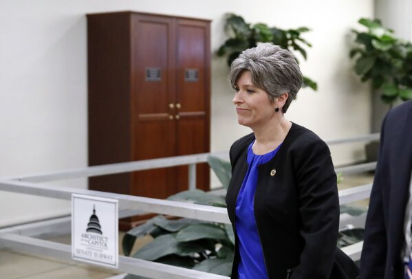 
              Sen. Joni Ernst, R-Iowa, arrives for a vote on Gina Haspel to be CIA director, on Capitol Hill, Thursday, May 17, 2018 in Washington. (AP Photo/Alex Brandon)
            