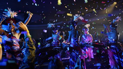 Performers celebrate at the finish of the Mahu Magic drag show at the Western Regional Native Hawaiian Convention, Tuesday, June 20, 2023, in Las Vegas. (AP Photo/John Locher)