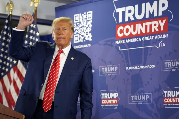 Republican presidential candidate former President Donald Trump reacts after speaking at a rally at Des Moines Area Community College in Newton, Iowa, Saturday, Jan. 6, 2024. (AP Photo/Andrew Harnik)