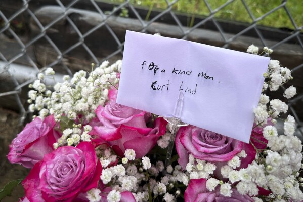 Flowers sit outside the property where San Francisco Bay Area prosecutors say Maximilian Snyder killed landlord Curtis Lind in Vallejo, California, Friday, Jan. 31, 2025. (AP Photo/Janie Har)