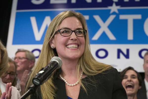 FILE - Democrat Jennifer Wexton speaks at her election night party after defeating Rep. Barbara Comstock, R-Va., Tuesday, Nov. 6, 2018, in Dulles, Va. A rare neurological disease robbed Wexton of her ability to speak clearly. But with the help of a powerful artificial intelligence program, the Virginia Democrat will use a clone of her voice to deliver what is believed to be the first speech on the House floor ever given via a voice cloned by artificial intelligence, thrusting Wexton into a broader debate about over artificial intelligence. (AP Photo/Alex Brandon, File)