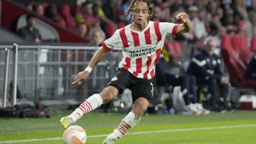 FILE - PSV's Xavi Simons controls the ball during the Europa League group A soccer match between PSV and Arsenal at the Philips stadium in Eindhoven, Netherlands, Thursday, Oct. 27, 2022. Simons has returned to Paris Saint-Germain on the back of an excellent season, only to be sent on loan to Leipzig. PSG said in a statement on Wednesday, July 19, 2023 that Simons, who joined from PSV Eindhoven until 2027, would be loaned to the Bundesliga side for the 2023-24 season. (AP Photo/Peter Dejong, file)