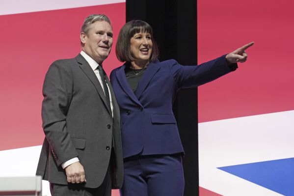 Britain's shadow chancellor Rachel Reeves with party leader Keir Starmer after making her keynote speech during the Labour Party Conference in Liverpool, England, Monday Oct. 9, 2023. (Stefan Rousseau/PA via AP)