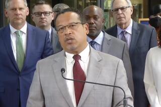 FILE - In this image taken from video, Minnesota Attorney General Keith Ellison speaks to the media Friday, June 25, 2021, at the Hennepin County Courthouse in Minneapolis. Democratic Minnesota Attorney General Keith Ellison, who led the prosecution team that won the conviction of ex-officer Derek Chauvin in the death of George Floyd, announced Monday, Nov. 15, 2021, he will seek a second term. (Court TV via AP, Pool File)