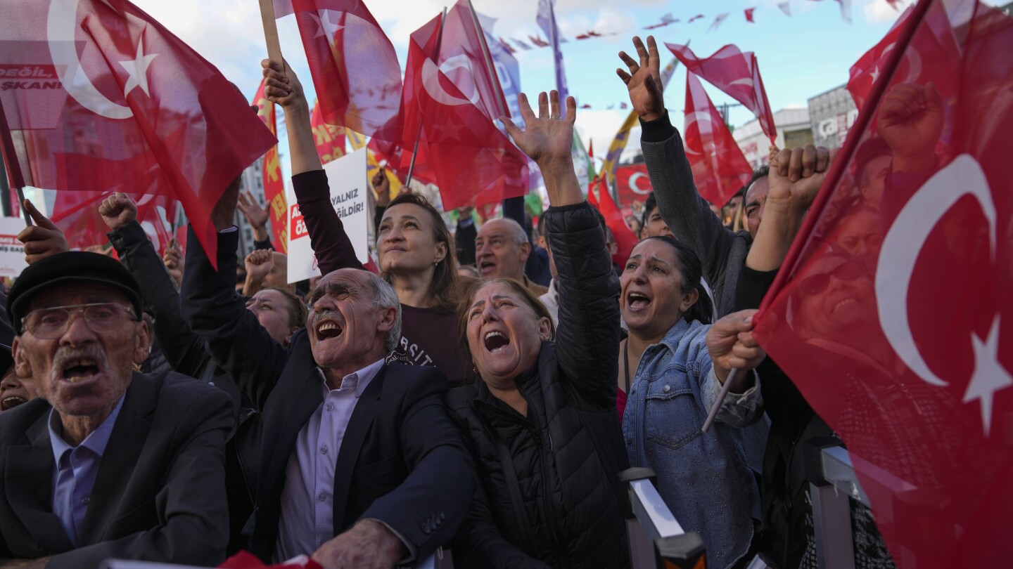 Hundreds in Turkey protest the arrest and ouster of opposition mayor