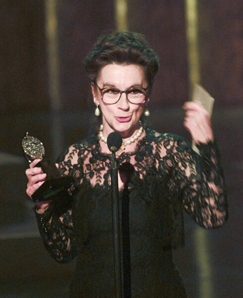 FILE - In this June 2, 1996, file photo, Zoe Caldwell holds her award for Leading Actress in a Play for her role in "Master Class" at the 50th Annual Tony Awards in New York. Caldwell, a four-time Tony Award winner famous for portraying larger-than-life characters, has died. Her son Charlie Whitehead said Caldwell died peacefully Sunday, Feb. 16, 2020, at her home in Pound Ridge, New York. She was 86. Whitehead said her death was due to complications from Parkinson's disease. (AP Photo/Ron Frehm, File)