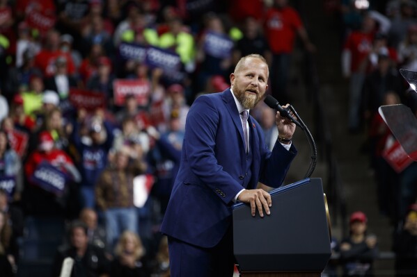FILE - Brad Parscale, then-campaign manager for President Donald Trump, speaks during a campaign rally at the Target Center in Minneapolis, Oct. 10, 2019. Parscale, the digital campaign operative who helped engineer Trump’s 2016 presidential victory, vows that his new, AI-powered platform will dramatically overhaul not just polling, but also campaigning. (AP Photo/Evan Vucci, File)