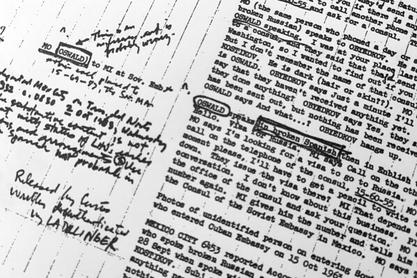 Part of a file from the CIA, dated Feb. 3, 1968, titled "Mexico City Chronology" about Lee Harvey Oswald's time in Mexico and contact with the embassy of the Soviet Union in Mexico City, that was released on Dec. 15, 2021, and that was part of the investigation into the assassination of President John F. Kennedy. (AP Photo/Jon Elswick, File)