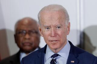 Democratic presidential candidate former Vice President Joe Biden, speaks as he is endorsed by House Majority Whip, Rep. Jim Clyburn, D-S.C., background, in North Charleston, S.C., Wednesday, Feb. 26, 2020. (AP Photo/Gerald Herbert)