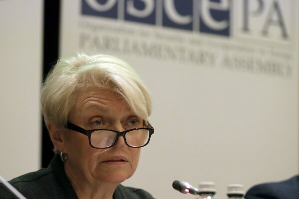 
              Doris Barnett, the head of the delegation of the Parliamentary Assembly of the Organisation for Security and Cooperation in Europe (OSCE PA), attends a news conference in Kiev, Ukraine, Monday, April 1, 2019. Early results in Ukraine's presidential election show comedian Volodymyr Zelenskiy maintaining a strong lead against the incumbent president in the first round of voting, setting the stage for a runoff vote in three weeks. (AP Photo/Sergei Grits)
            