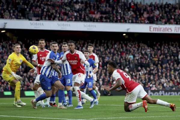Arsenal move top of Premier League with 2-0 win over Brighton