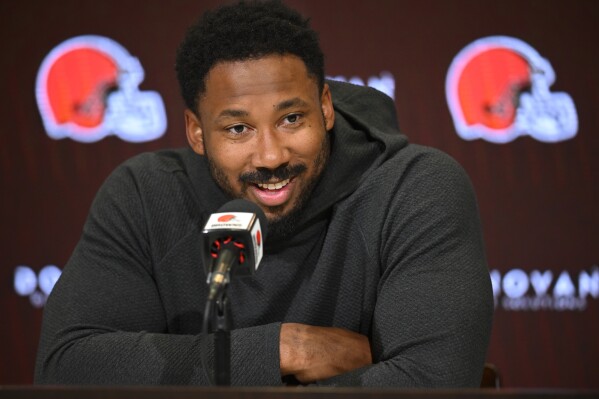 FILE - Cleveland Browns defensive end Myles Garrett speaks with the media during an NFL football news conference at the team's practice facility in Berea, Ohio, Tuesday, April 18, 2023. As Garrett heads into his seventh NFL season with the Cleveland Browns, Garrett ranks among the some of the best pass rushers in league history. (AP Photo/David Richard, File)