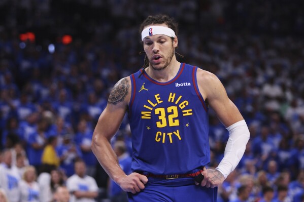 Denver Nuggets' Aaron Gordon (32) walks on the court late in the second half of Game 5 of an NBA basketball second-round playoff series against the Oklahoma City Thunder Tuesday, May 13, 2025, in Oklahoma City. (AP Photo/Nate Billings)