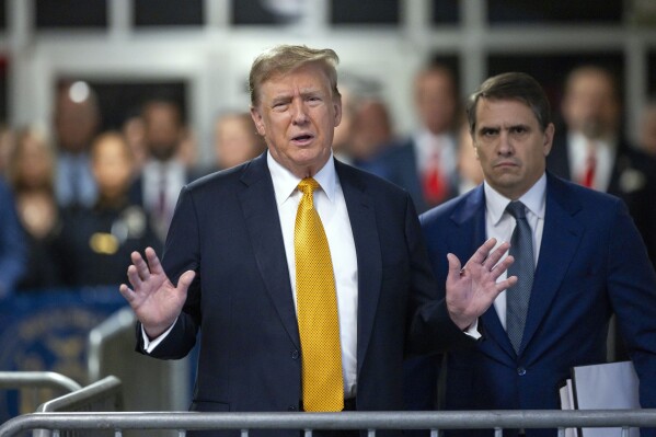 Former President Donald Trump speaks alongside his attorney Todd Blanche outside the courtroom in Manhattan Criminal Court, Tuesday, May 21, 2024, in New York. (Justin Lane/Pool Photo via AP)