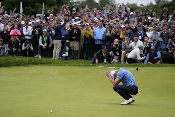 Will Zalatoris reacts after missing a putt on the 18th hole during the final round of the U.S. Open golf tournament at The Country Club, Sunday, June 19, 2022, in Brookline, Mass. (AP Photo/Charlie Riedel)