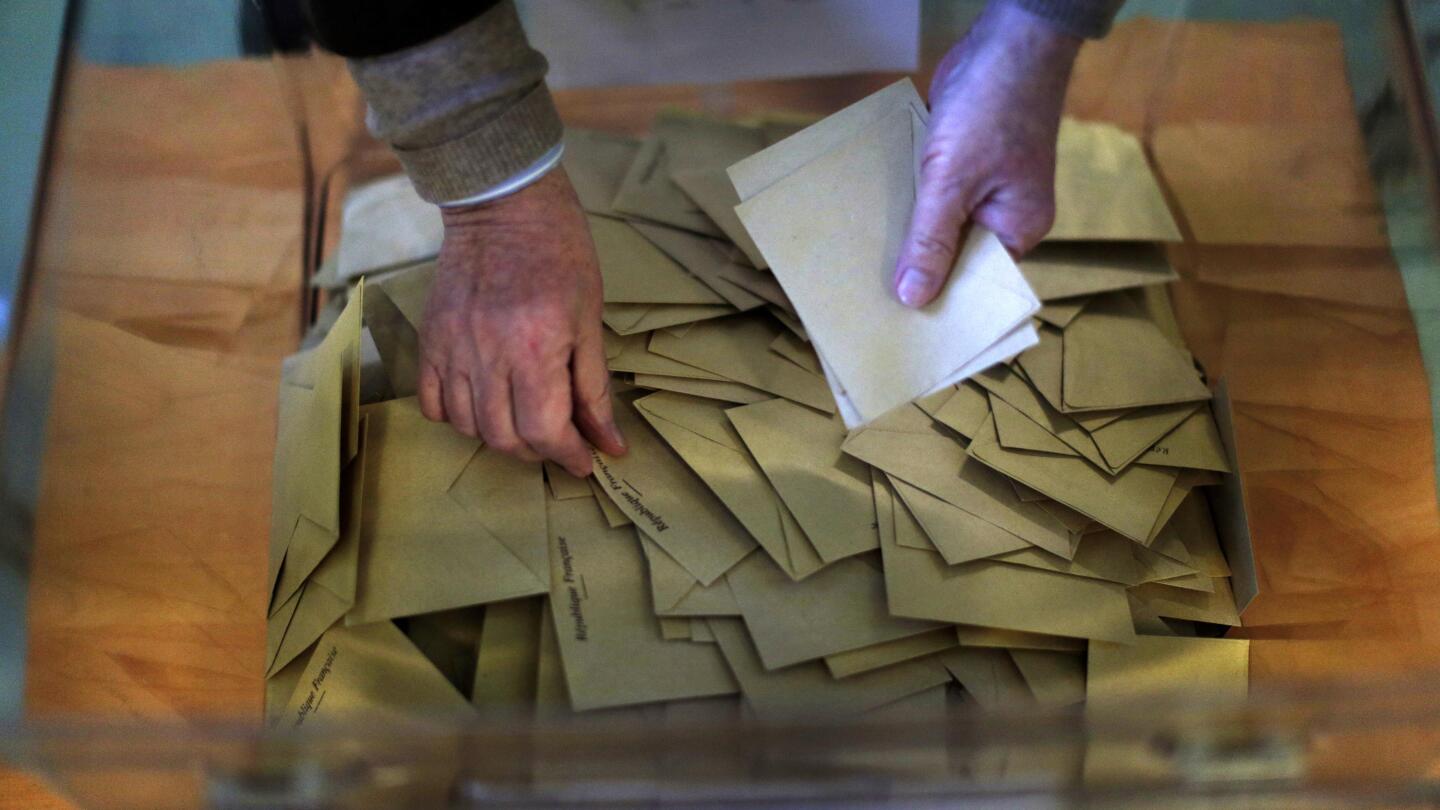 NextImg:Voting in France: Paper ballots, in person, hand-counted