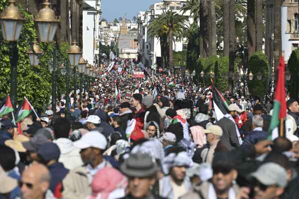 FILE - Moroccans take part in a protest in support of Palestinians in Gaza and against normalisation of relations between Morocco and Israel, in Rabat, Morocco, Sunday, Feb. 11, 2024. An activist who criticized Morocco’s decision to normalize relations with Israel was sentenced to five years in prison, as some of the Arab world's largest pro-Palestinian protests continue to sweep the country. (AP Photo, File)