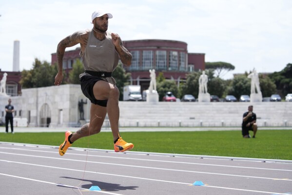 Defending Olympic 100 meters champion Marcell Jacobs runs during a training session in the historic Stadio dei Marmi ahead of an athletics meeting in Rome, Wednesday, May 15, 2024. (AP Photo/Alessandra Tarantino)