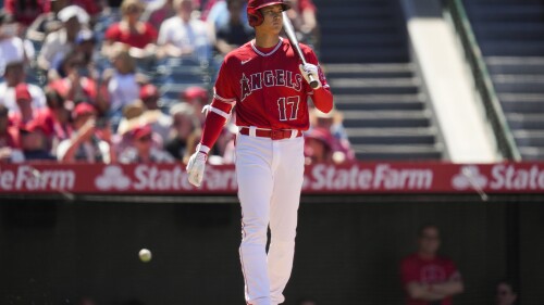 Los Angeles Angels designated hitter Shohei Ohtani (17) stands near home plate during the seventh inning of a baseball game against the Chicago White Sox in Anaheim, Calif., Thursday, June 29, 2023. (AP Photo/Ashley Landis)