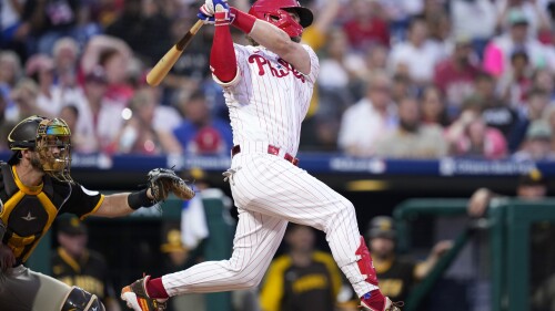 Philadelphia Phillies' Bryce Harper hits a home run against San Diego Padres pitcher Ryan Weathers during the fourth inning of the second baseball game in a doubleheader, Saturday, July 15, 2023, in Philadelphia. (AP Photo/Matt Slocum)