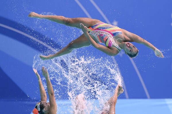 Brazil's team performs in the artistic swimming acrobatic routine final at the Pan American Games in Santiago, Chile, Friday, Nov. 3, 2023. (AP Photo/Matias Delacroix)