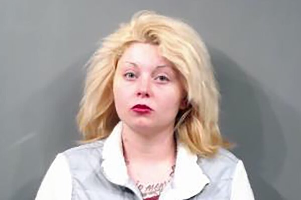 In this Thursday, Aug. 15, 2019, booking photo provided by the Sedgwick County, Kansas, Sheriff's Office is Kimberly Compass, a mother who was arrested Thursday, in the death of her 2-year-old son Zayden Jaynesahkluah, at a motel in Wichita on May 31, 2019. Compass is jailed without bond on suspicion of first-degree murder in the death of Jaynesahkluah. Sedgwick County prosecutor's office spokesman Dan Dillon said police plan to present their case Monday and that a charging decision will be made afterward. (Sedgwick County Sheriff's Office via AP)