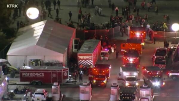 Emergency personnel respond to the Astroworld music festival in Houston on Friday, Nov. 5, 2021.  Several people died and numerous others were injured in what officials described as a surge of the crowd at the music festival while Travis Scott was performing. Officials declared a “mass casualty incident” just after 9 p.m. Friday during the festival where an estimated 50,000 people were in attendance, Houston Fire Chief Samuel Peña told reporters at a news conference. (KTRK via AP)