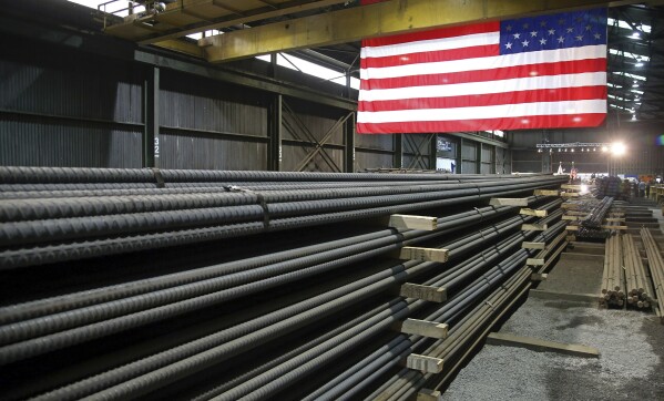 Steel rods, which were produced in the Gerdau American Mill in St. Paul, Minnesota, is waiting for shipping, May 9, 2019. (AP Photo/Jim Mone, File)