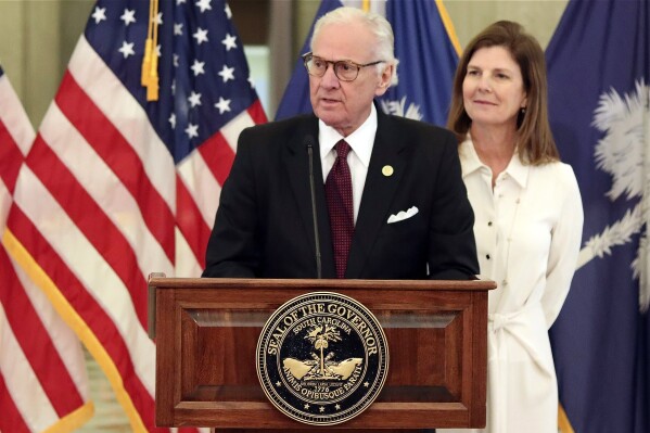 South Carolina Republican Gov. Henry McMaster, along with Lt. Gov. Pamela Evette, unveils his executive budget proposal in Columbia, S.C., Friday, Jan. 5, 2024. State lawmakers will start the budget process when the 2024 legislative session begins next week. (AP Photo/James Pollard)