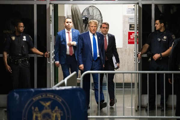 Former President Donald Trump walks into the courtroom following a lunch break during the proceedings in his trial at Manhattan criminal court in New York, on Friday, May 3, 2024.  (Doug Mills/The New York Times via AP, Pool)